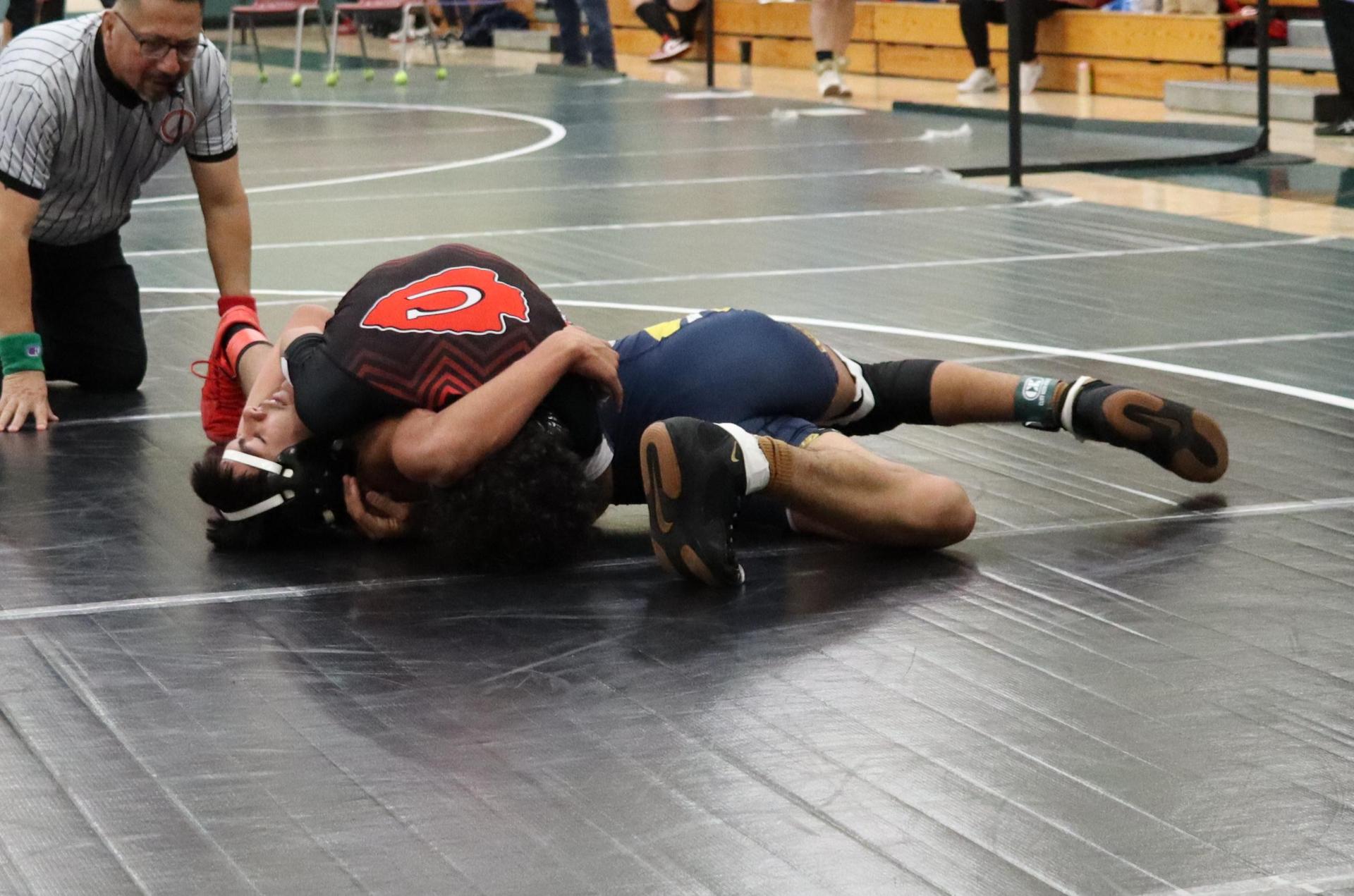 wrestlers in action at the Hawks invitational