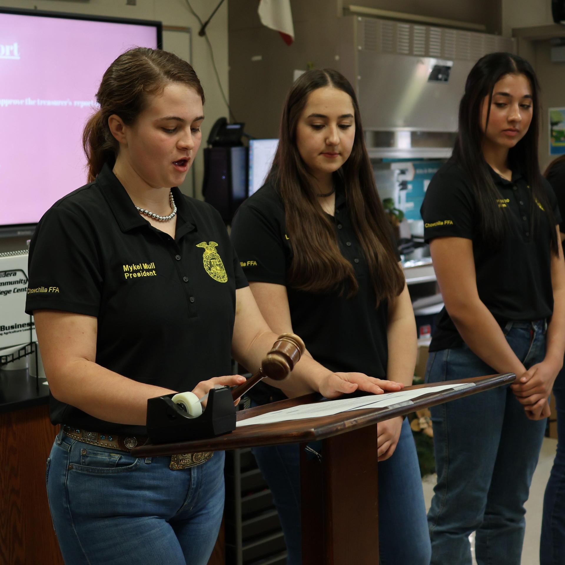 Future Farmer officers conducting the meeting