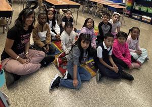 Students sitting down to read together