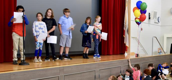 Poets at 5th Grade IB Exhibition assembly