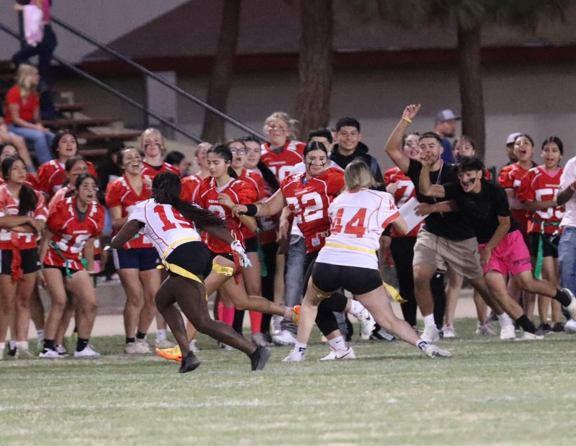girls playing flag football