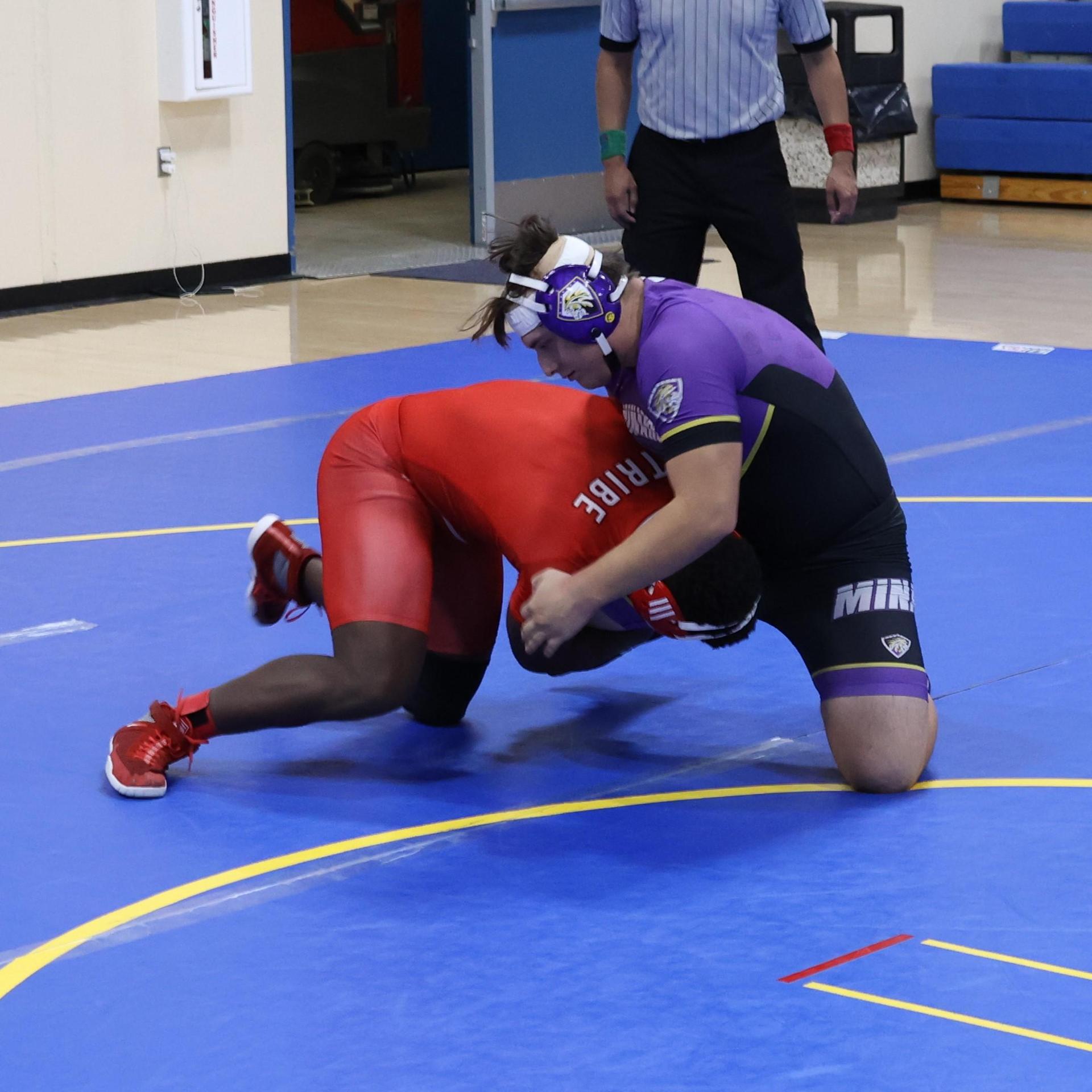 wrestlers in action at parlier