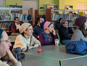 Parents listening at the event