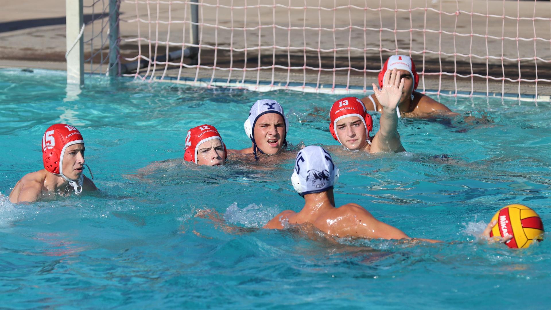 Boys playing water polo against Yosemite