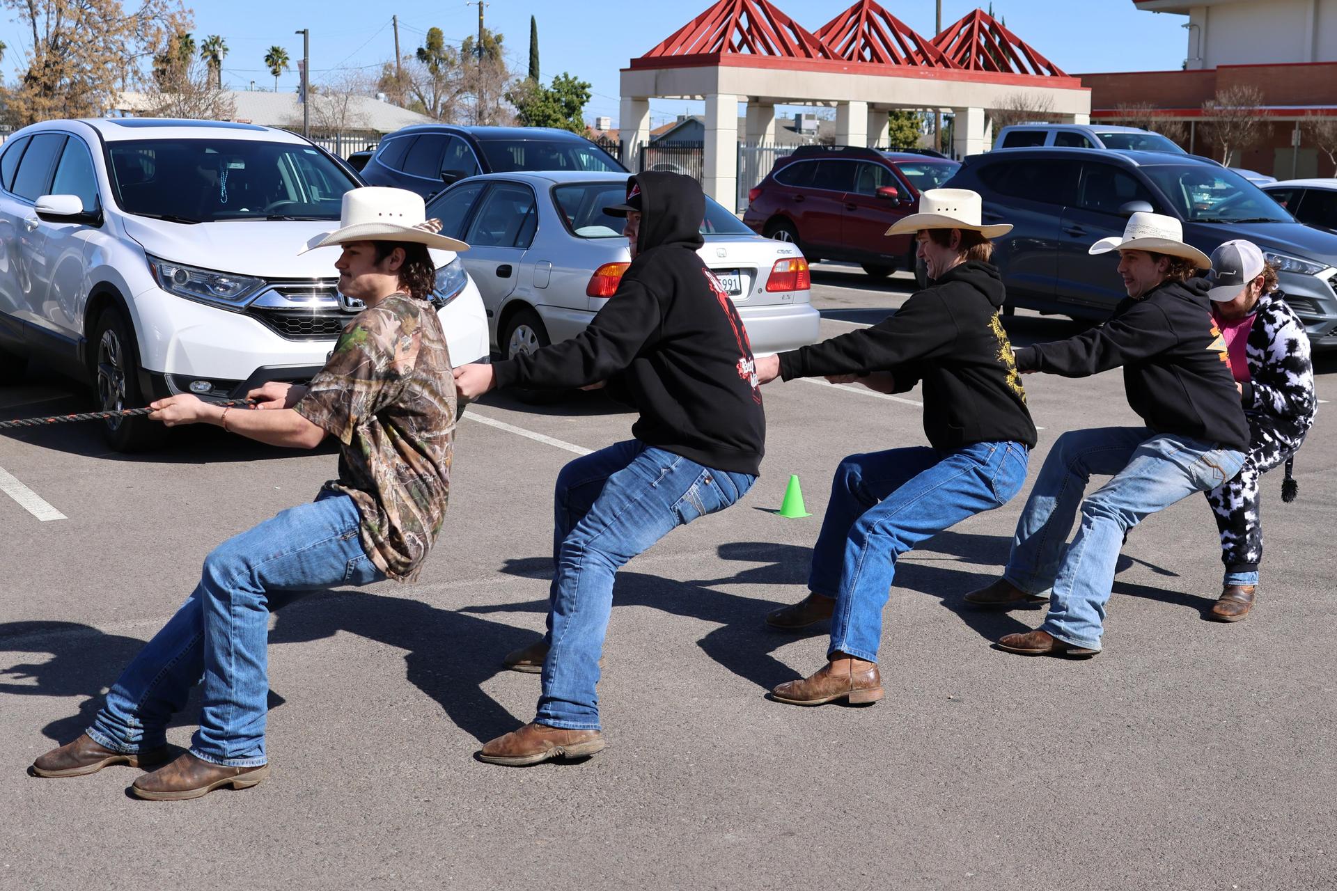 students and staff enjoying the truck pull