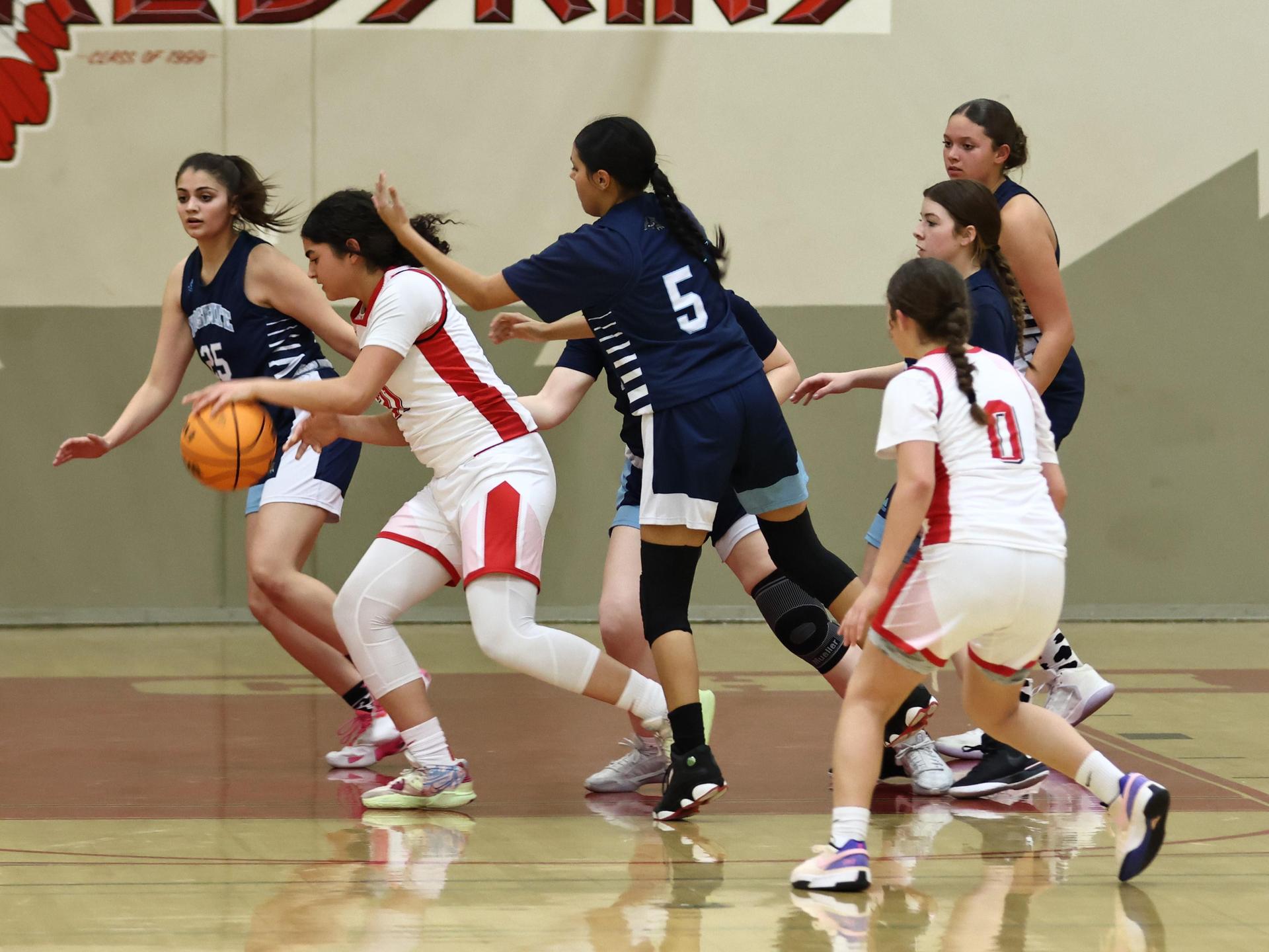 varsity girls playing against yosemite