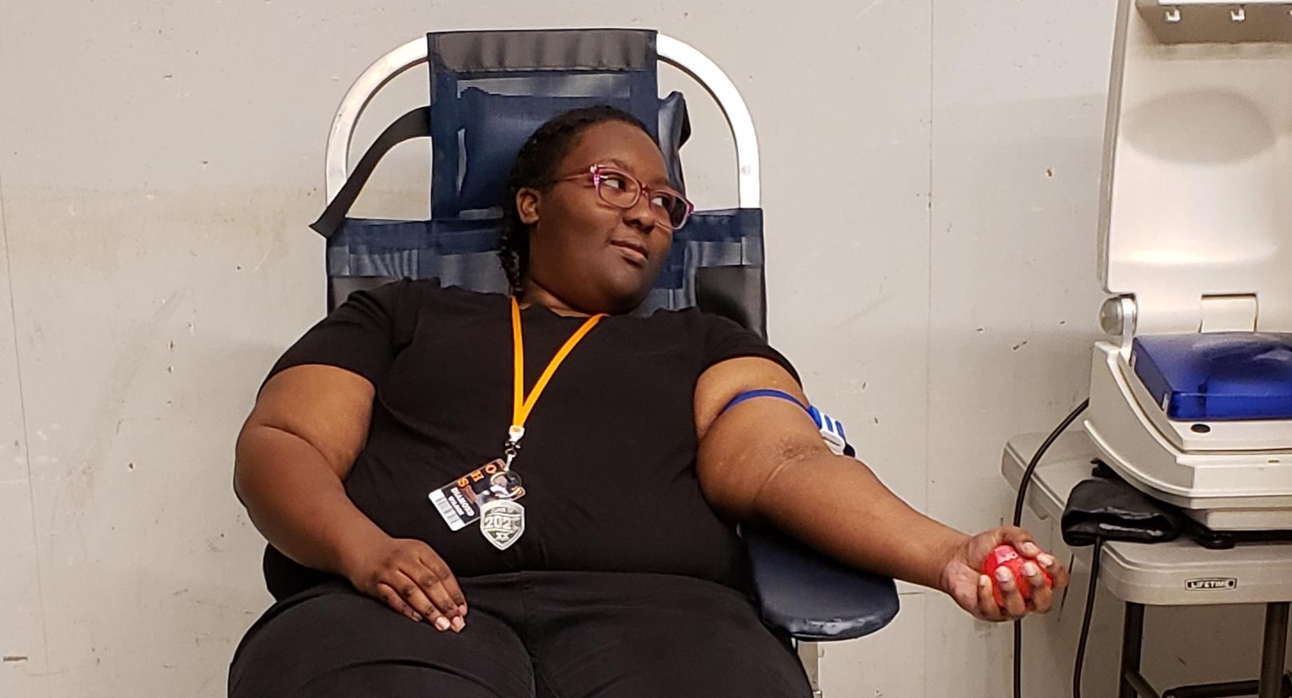 Diamond Wilson prepares to donate blood.