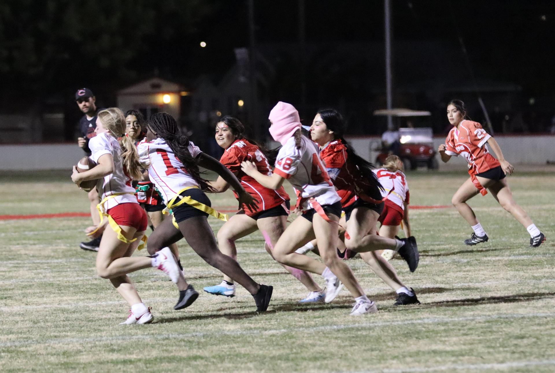 girls playing flag football