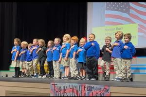 Students Singing on Stage at Veteran's Day Program