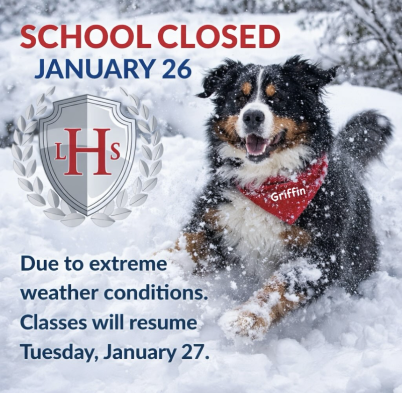 LHS comfort dog is playing in the snow, school closed January 26.