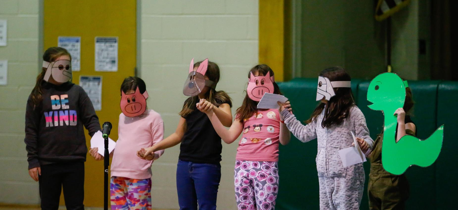 Six students performing a skit