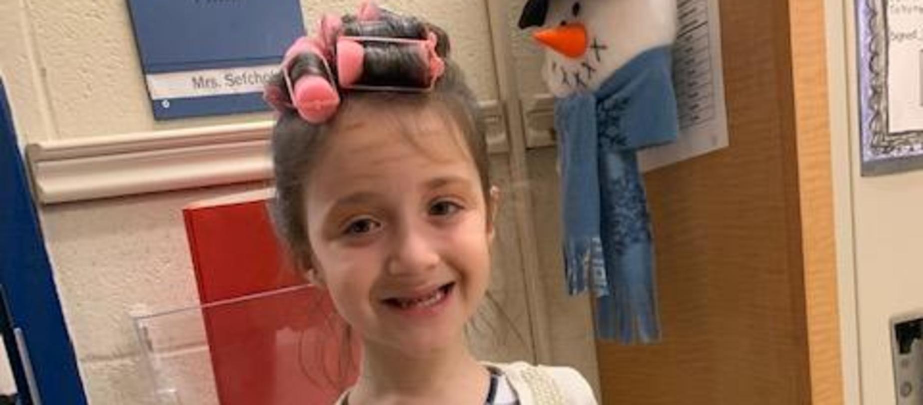student dressed like she's 100