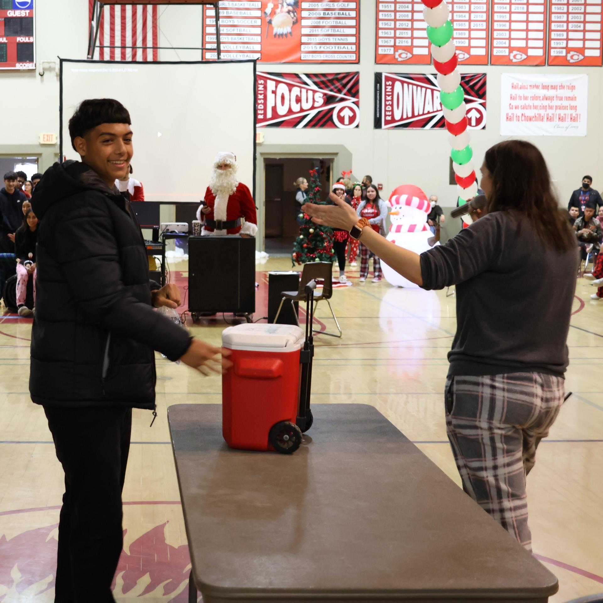 students receiving gifts