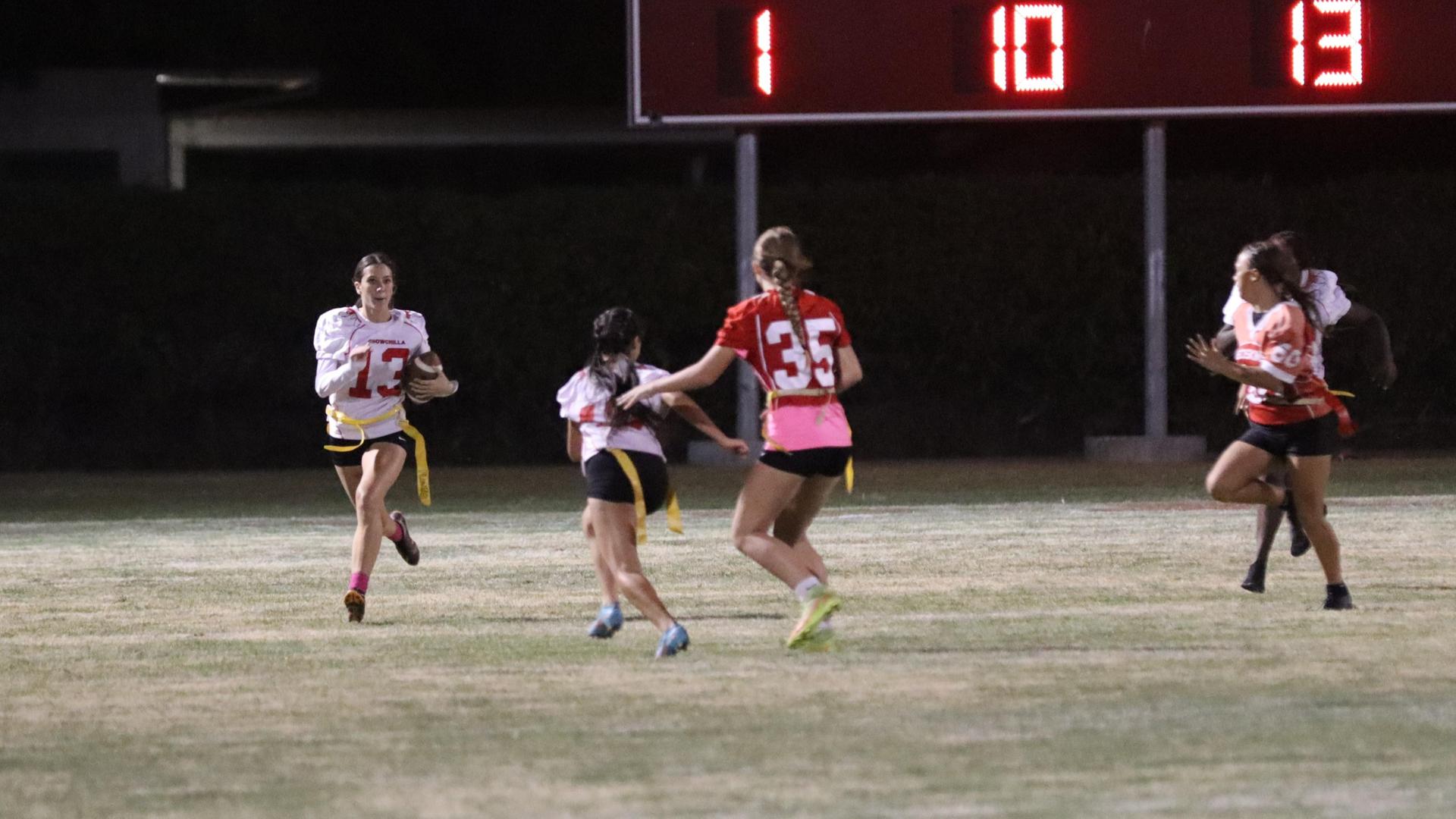 girls playing flag football