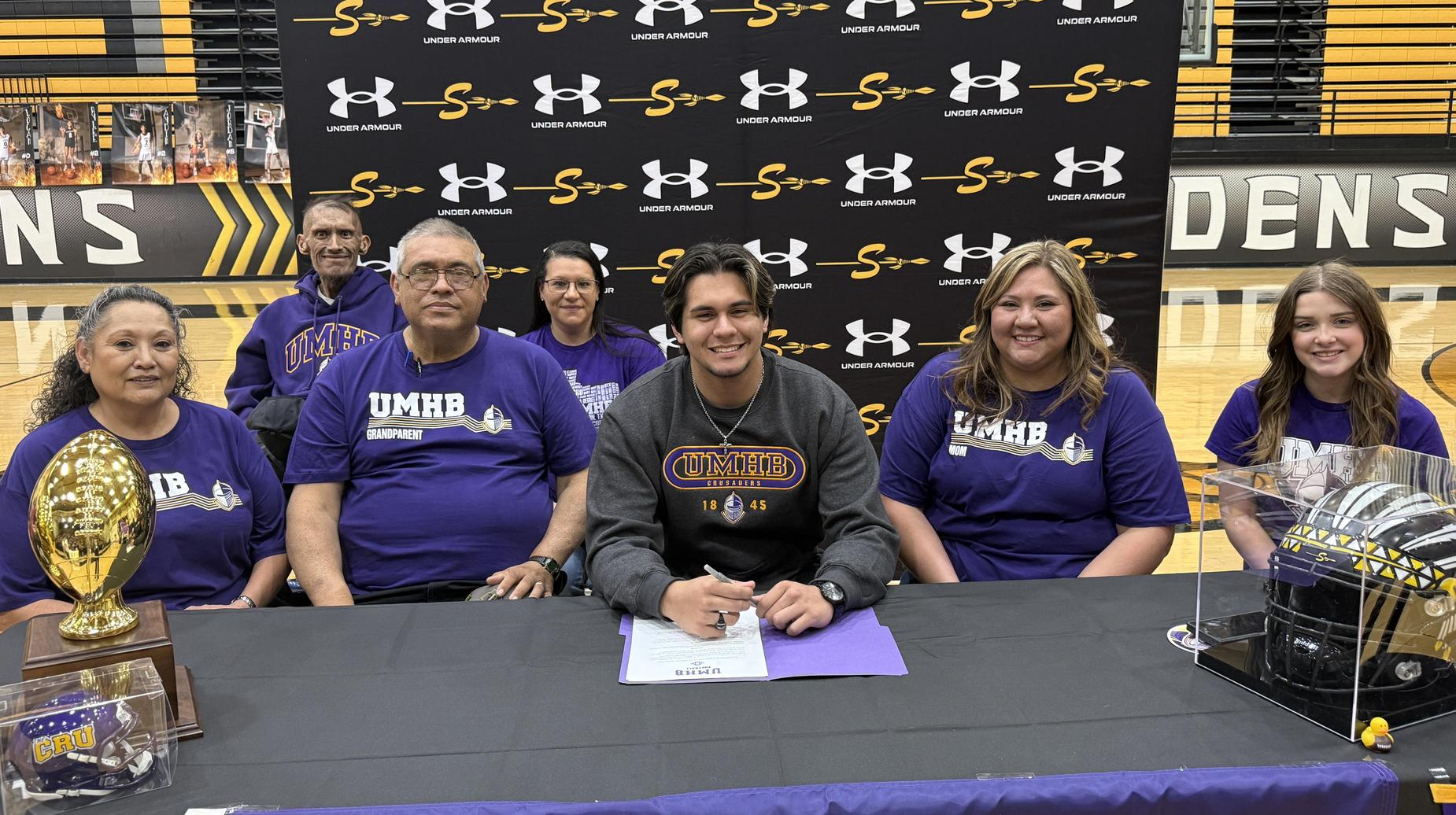 Gabryl Alaniz signing his letter of intent to play football at the University of Mary Hardin-Baylor in Belton