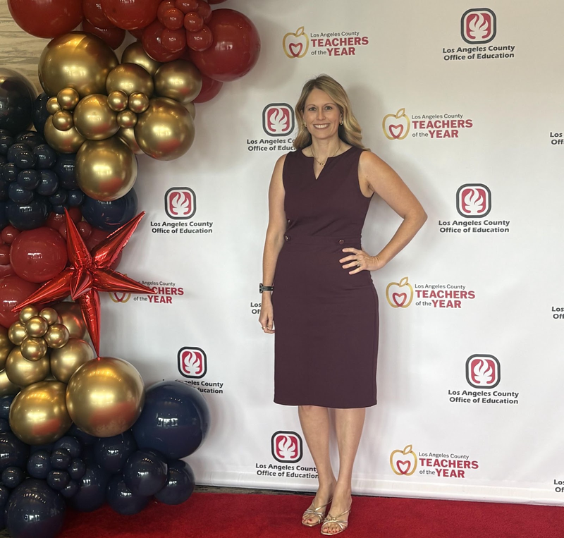 Amber Feldman, a blond woman at a red carpet event.