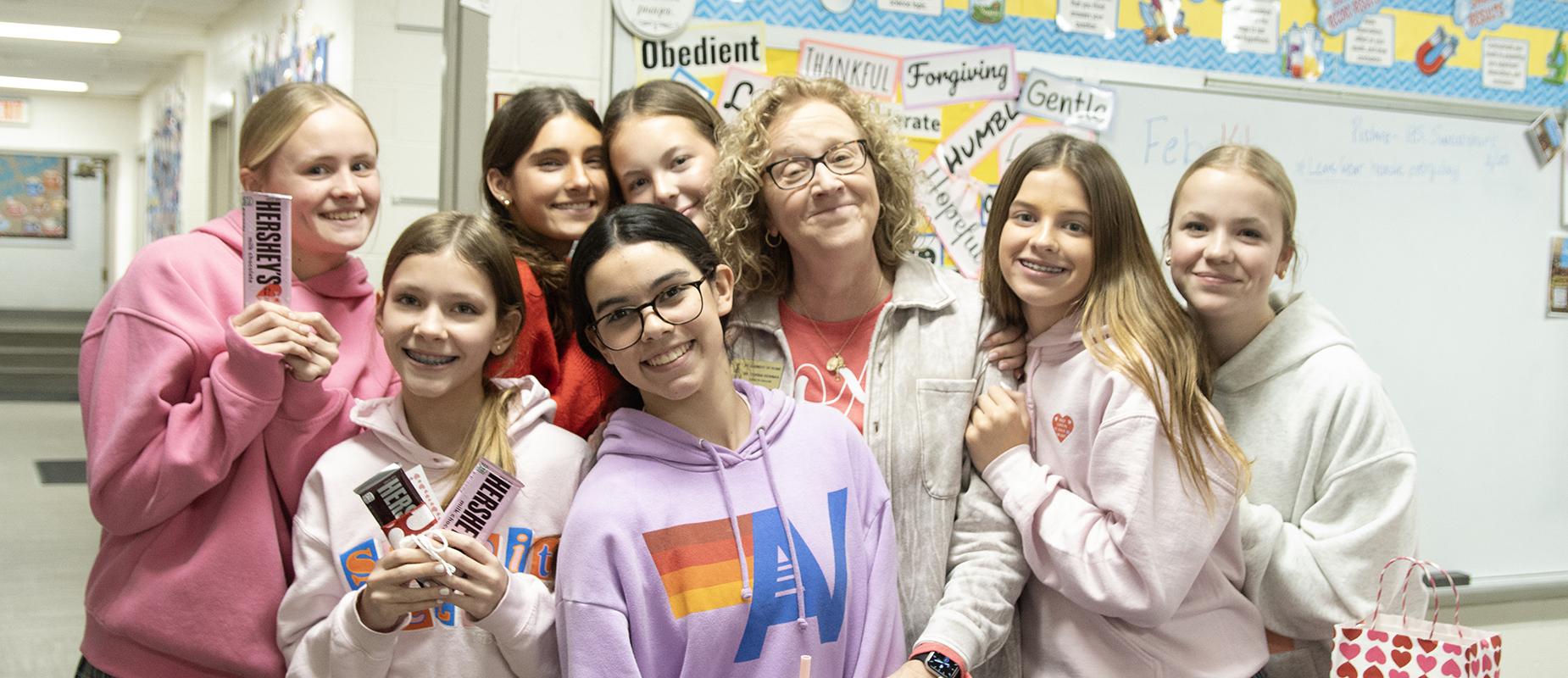 Dr. Newman with the 8th Grade girls on Valentine's Day