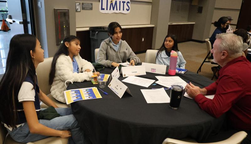 Students sitting down with EMCSD administrators and staff to discuss their experience at schools.