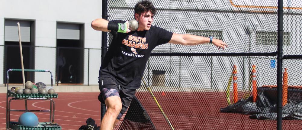 boy on track and field