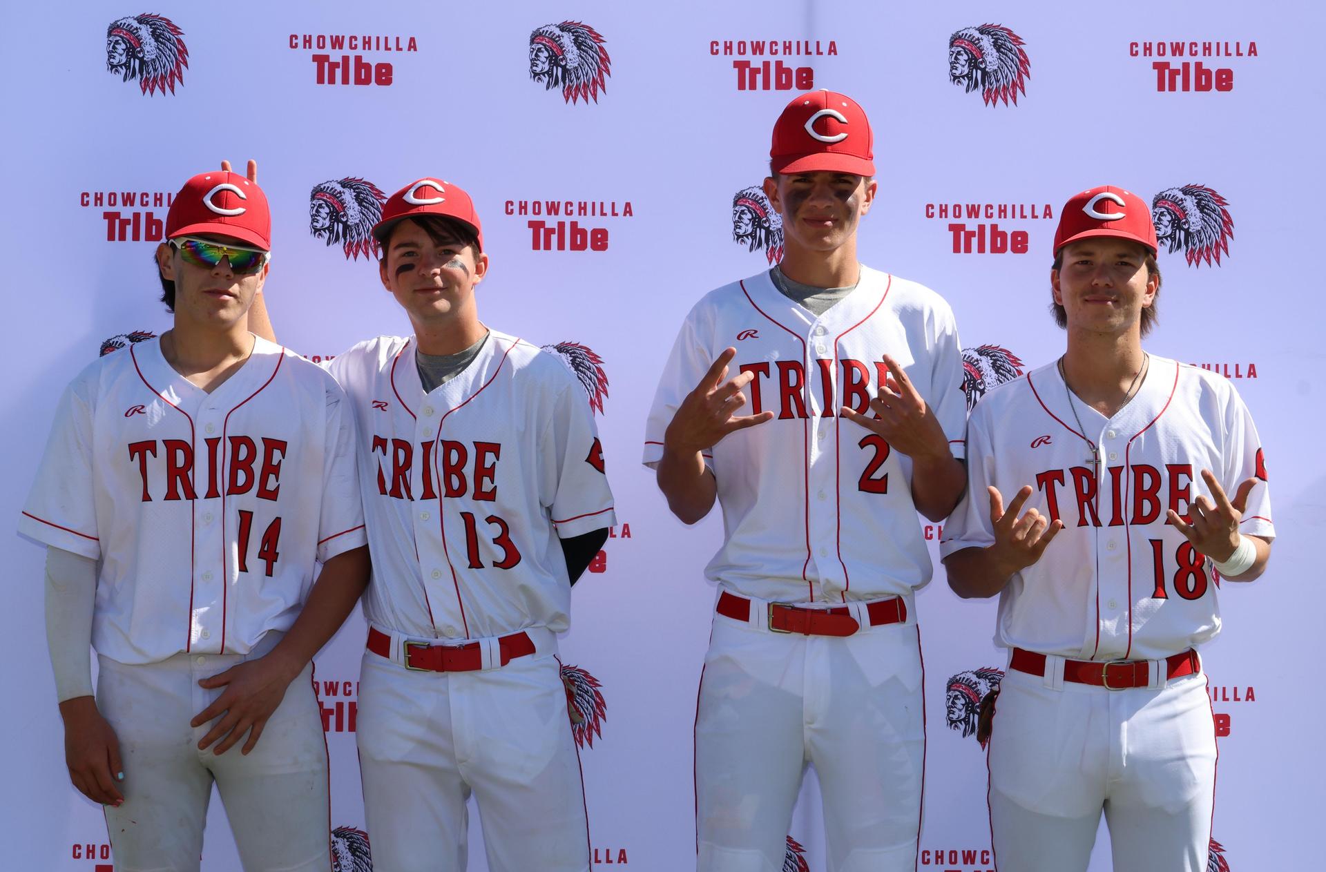 Seniors Posing With Teammates, Coaches, And Family