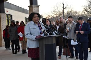 Jocelyn Speaking at podium