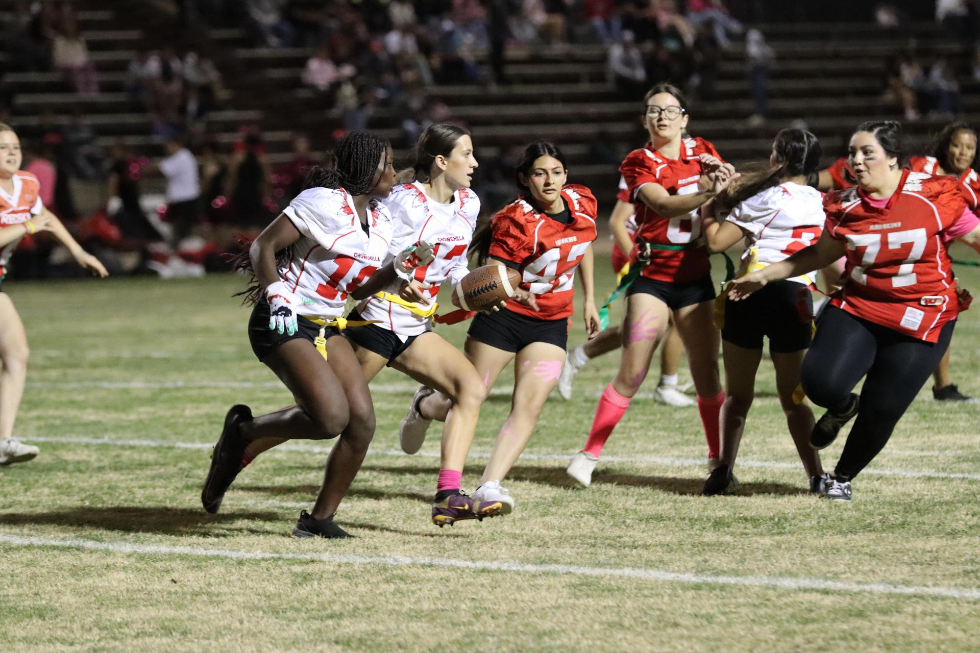 girls playing flag football