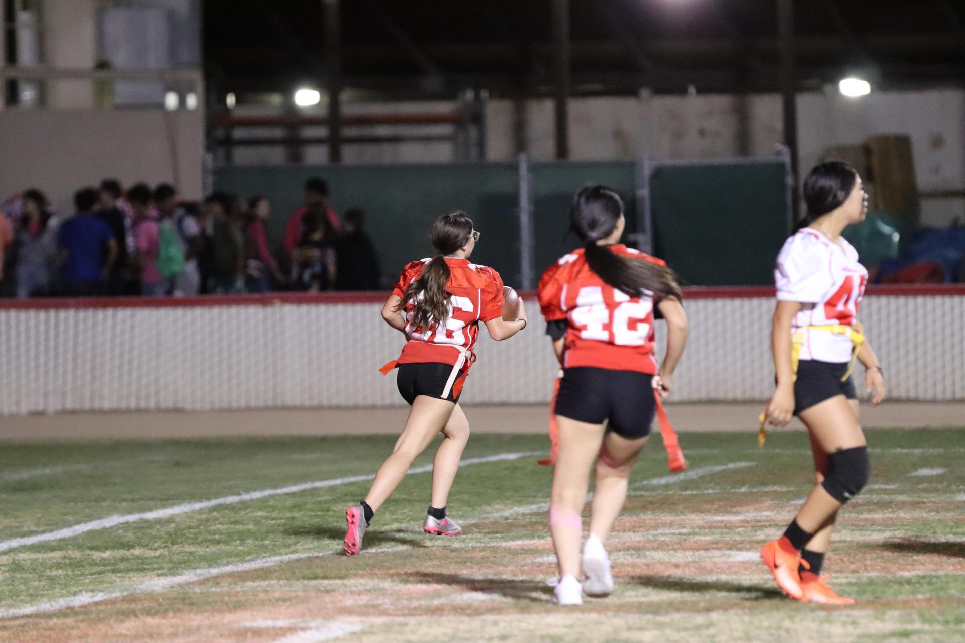 girls playing flag football