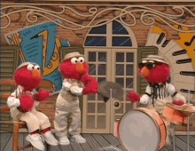 Elmos playing instruments