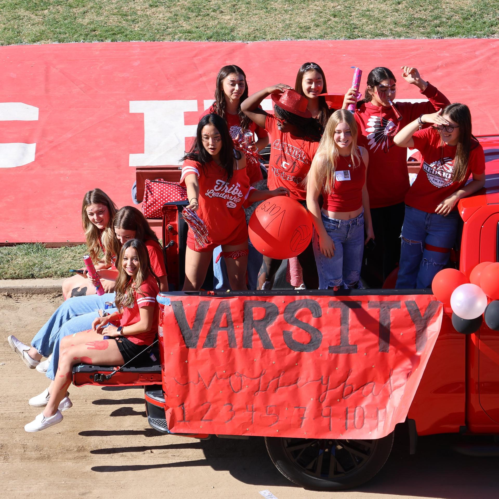 students and staff at the homecoming rally