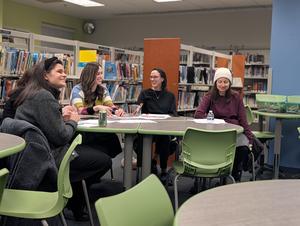 Parents share a chuckle at the nutrition event.