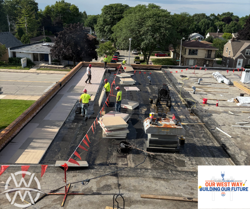 Construction Workers on a roof