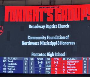 jumbotron mentioning PHS choir as a featured guest for the game