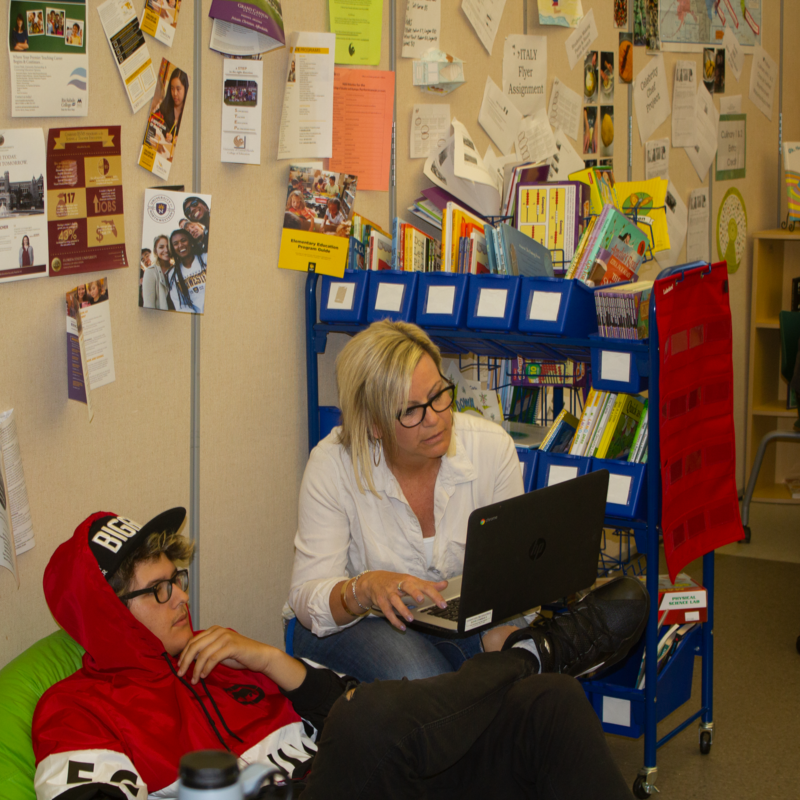 Teacher with student