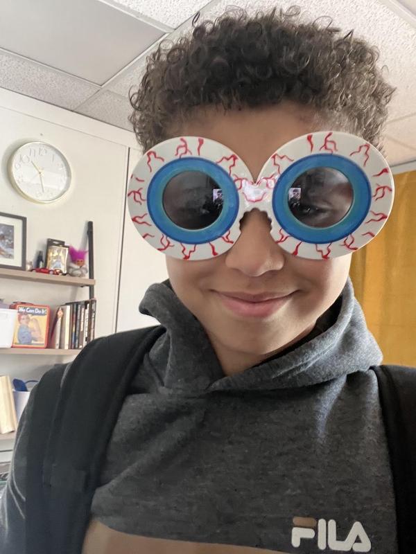 Male student in funny eyeball glasses