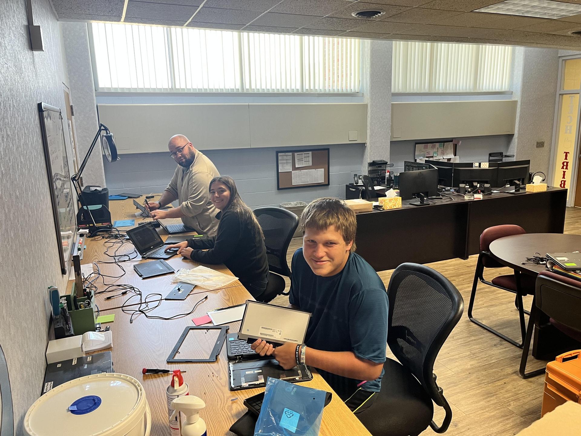 Tech Tribe students working or learning