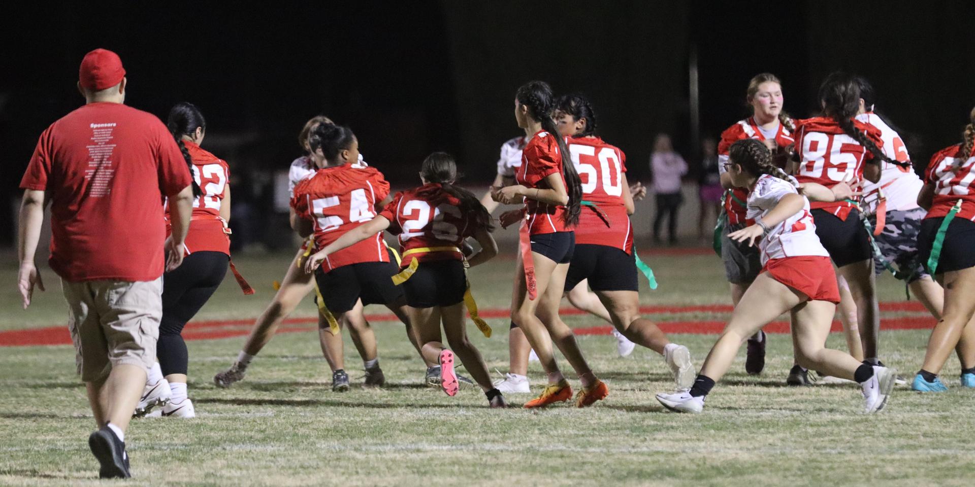 girls playing flag football