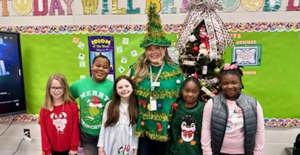 Teacher and students Christmas picture