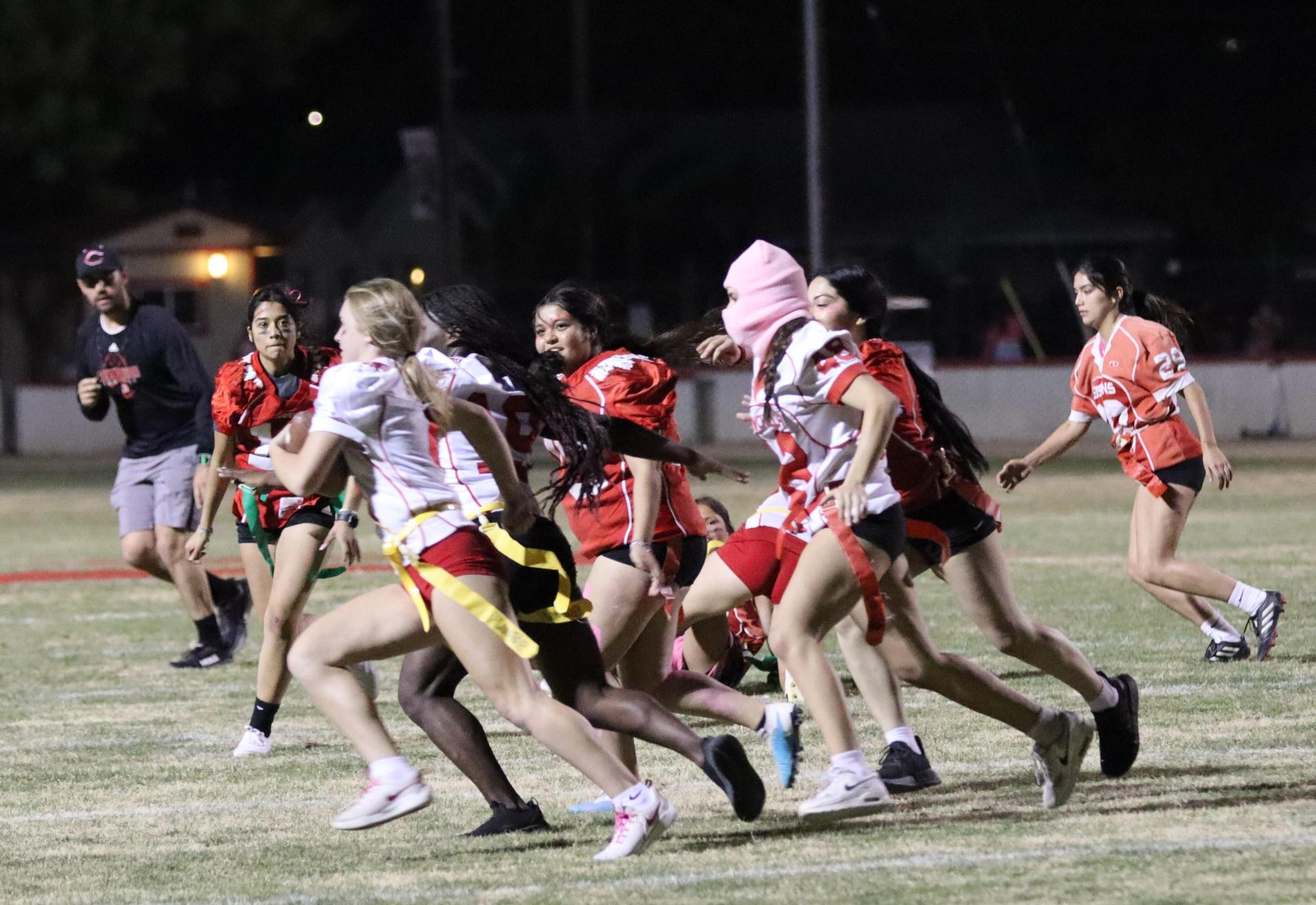 girls playing flag football