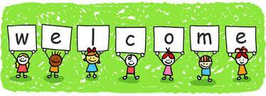 children holding tiles with letters