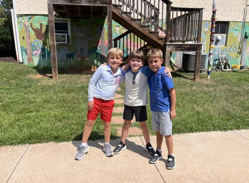 group of three students photo