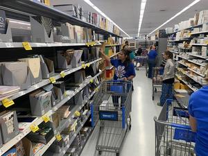 Teachers fill their carts during shopping spree