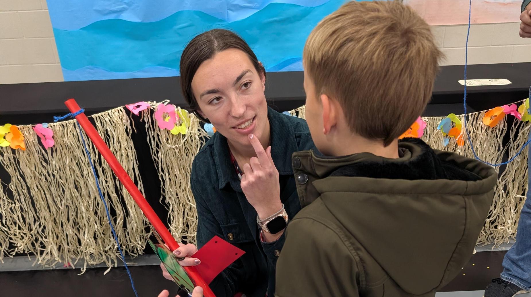 Ms. Stringfellow with a student