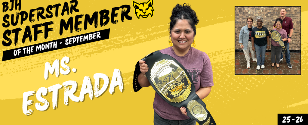 A woman holds a championship belt, celebrating her award with a group photo in the background.