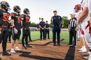Local first responders led the coin toss during the SPHS varsity football game on September 11, 2026. (Photo Courtesy of Mac Shropshire)