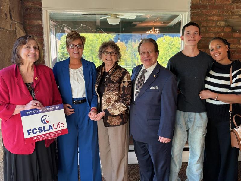 FCSLA President Cynthia Maleski presents to Marlene' Petro