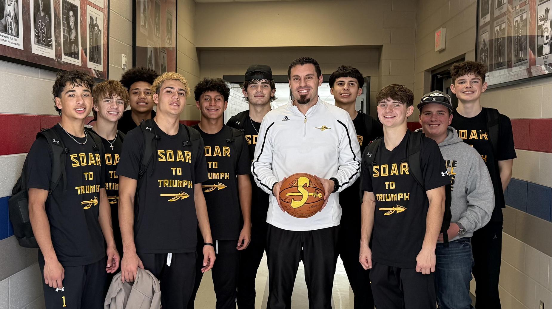 Coach Moore and the SHS Indian basketball team