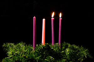 advent wreath with 2 purple candles lit