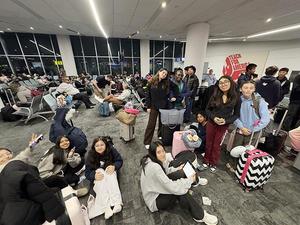 eighth grade students at the airport