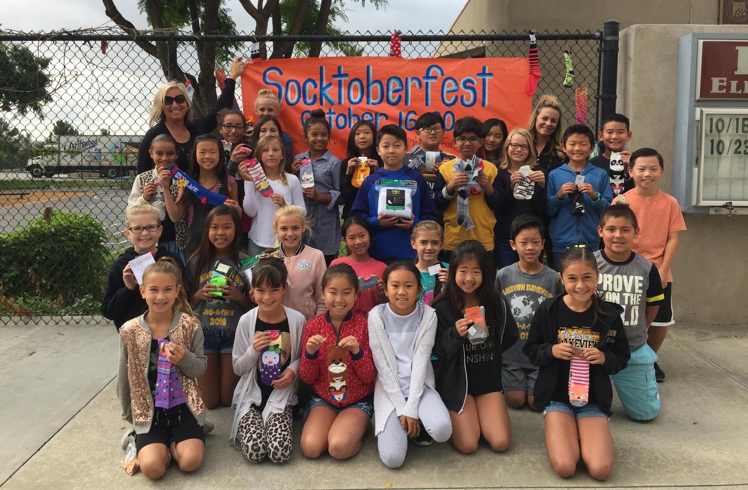 Students collecting socks for Socktoberfest