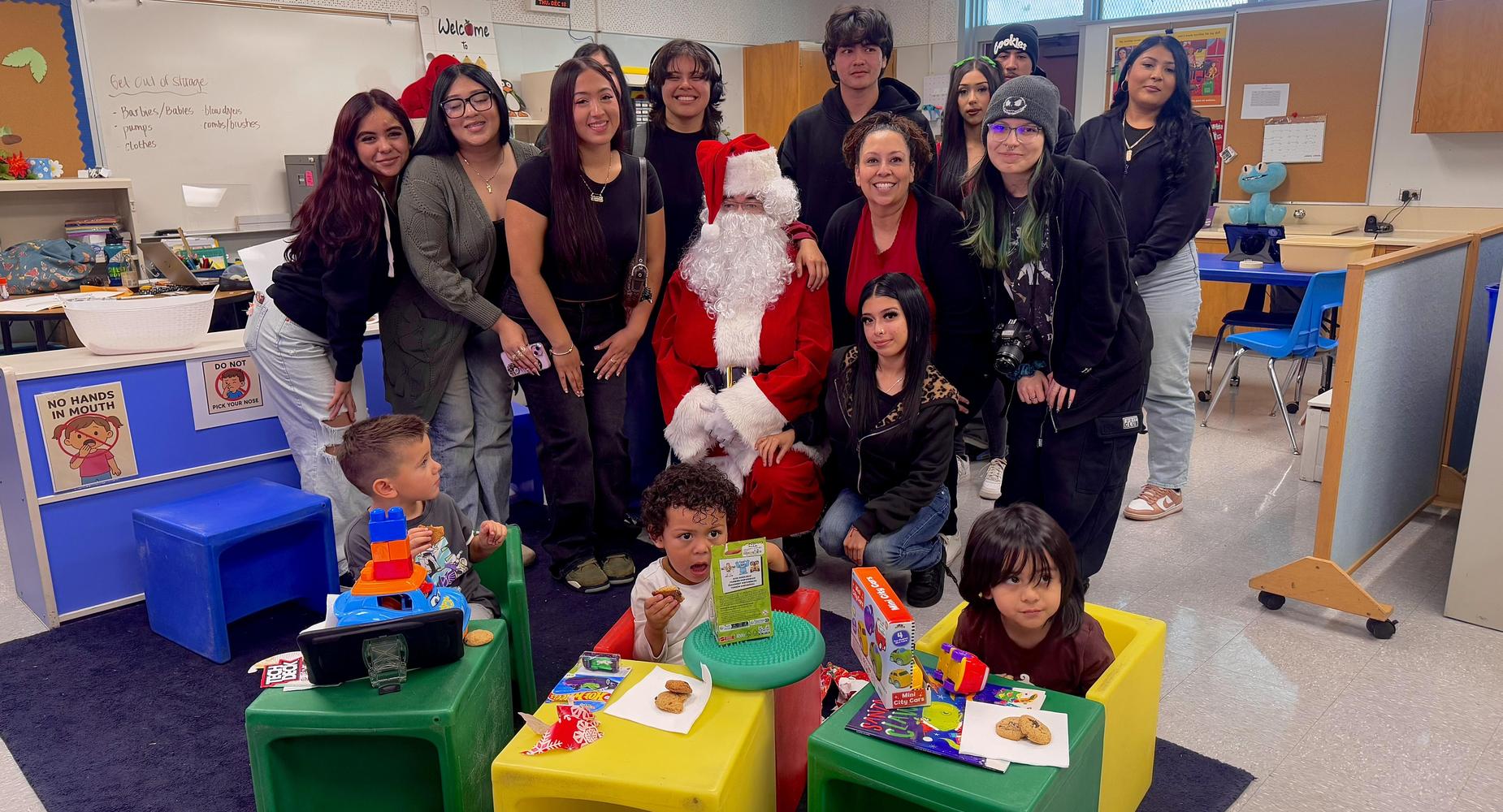 ASB and Santa visiting the Pre-k